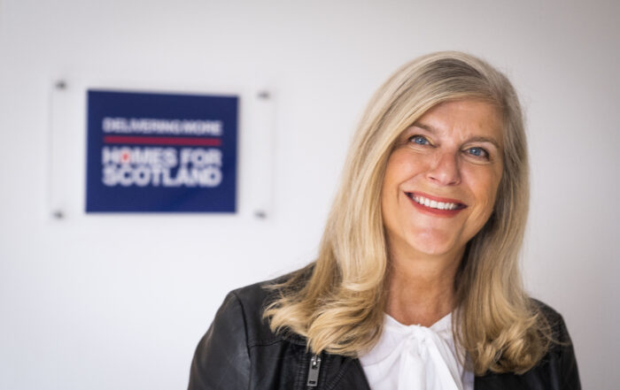 Jane Wood and Homes for Scotland logo in background